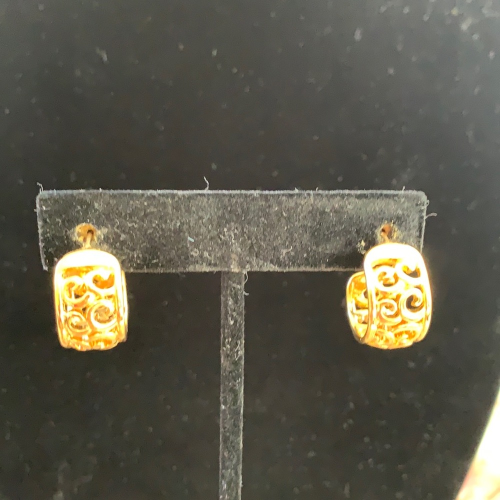 Set of three gold huggie earrings